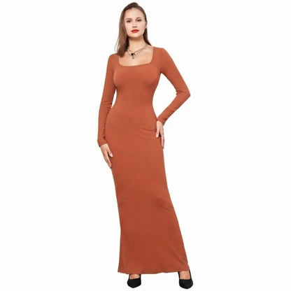 Robe longue moulante avec gaine intégrée. Manches Longues.